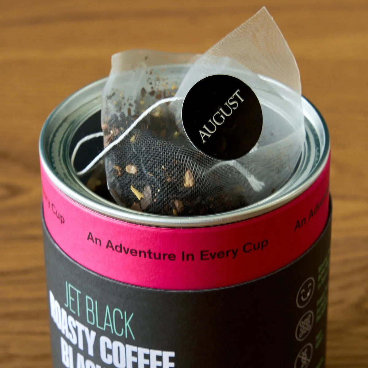 Open Jet Black canister showing pyramid tea bags inside, Da LBI Tea