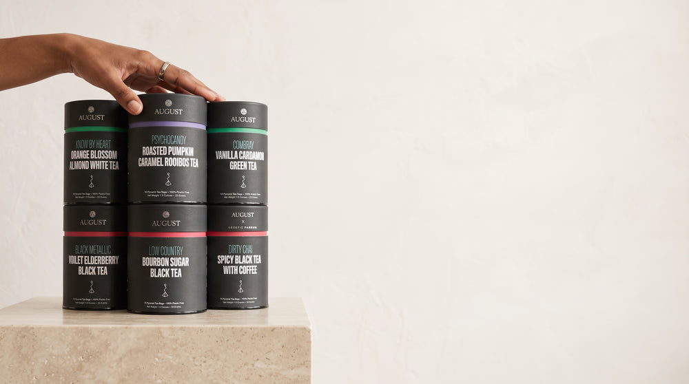 Stacked tins of loose-leaf tea including Psychocandy and Low Country, by Da LBI Tea