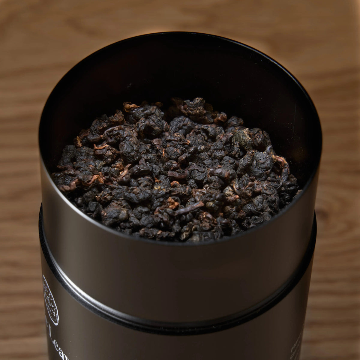 Da LBI Tea Rare Leaves Black Pearl single estate taiwanese dark roasted oolong tea, open tin showing loose leaves