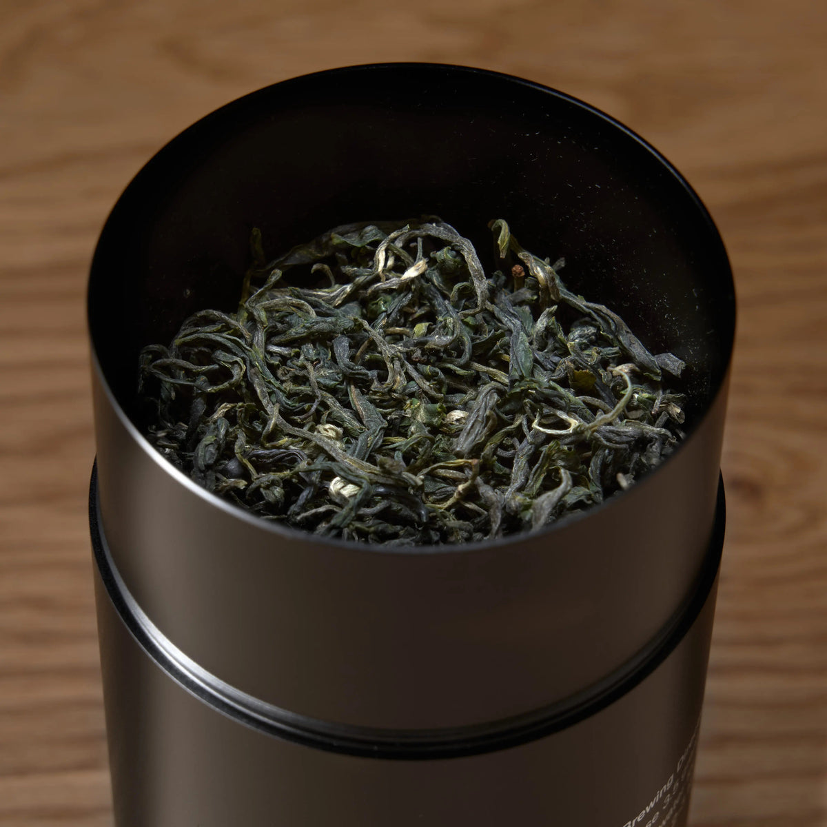Da LBI Tea Rare Leaves Emerald single estate pi lo chun green tea, open tin showing loose leaves